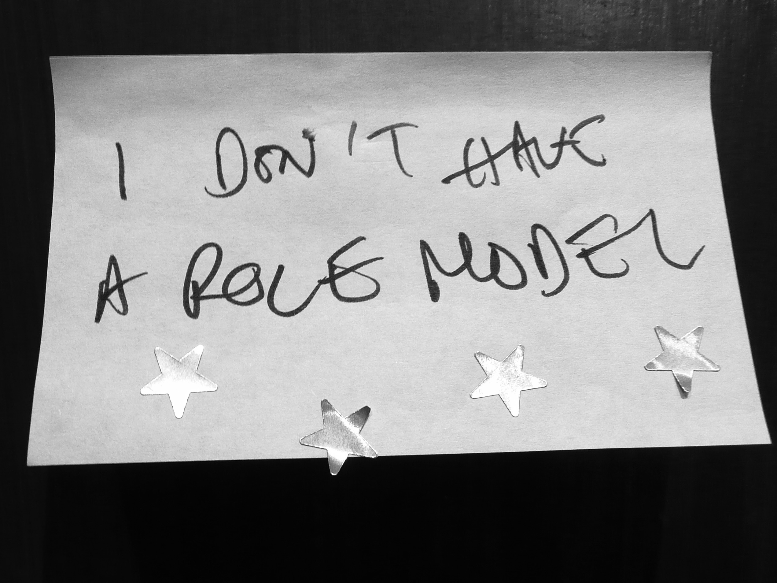 Post-it note that reads "I don't have a role model"